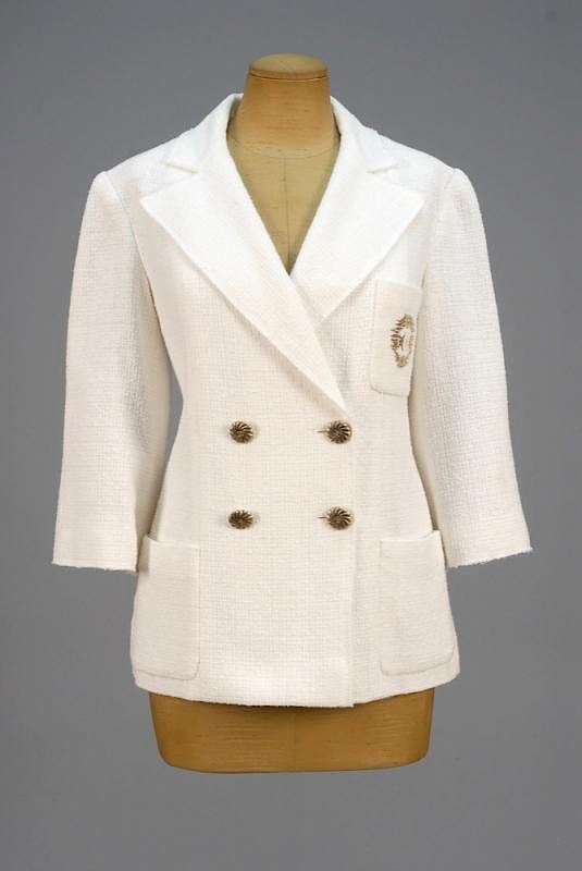 Appraisal: CHANEL DOUBLE BREASTED COTTON JACKET White nubby weave with sleeve