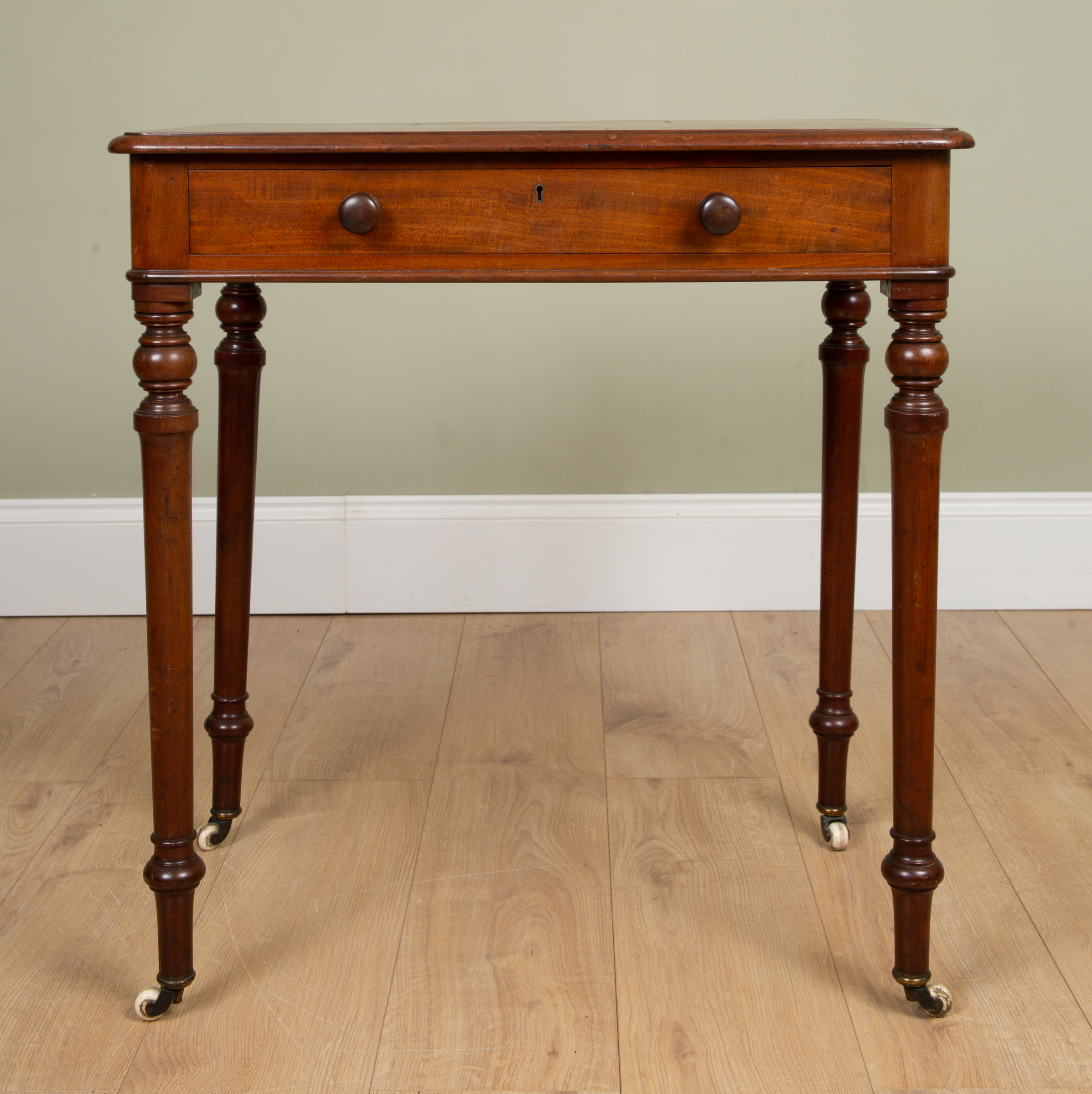 Appraisal: A Gillow-style early th century mahogany chamber table with pen