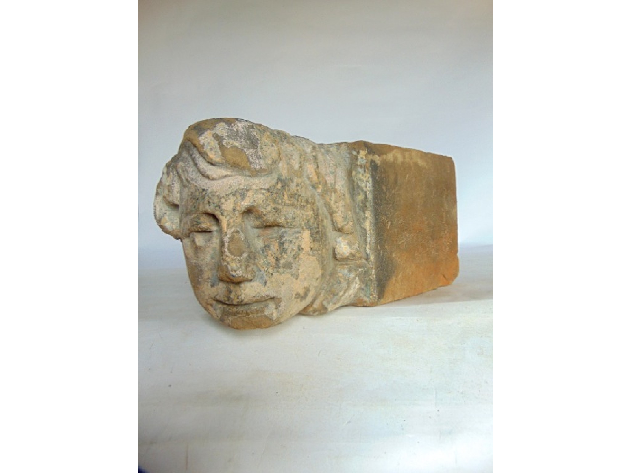 Appraisal: An old possibly Medieval carved limestone boss probably ecclesiastical in