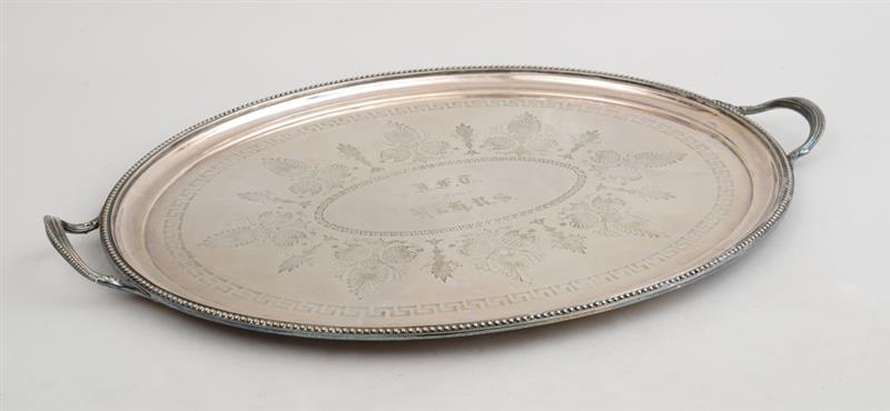 Appraisal: VICTORIAN SILVER-PLATED TWO-HANDLED TRAY Engraved with bands of anthemia and