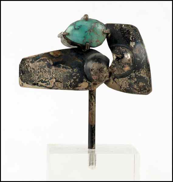 Appraisal: MID CENTURY SILVER AND TURQUOISE SCULPTURE Mounted on lucite Height