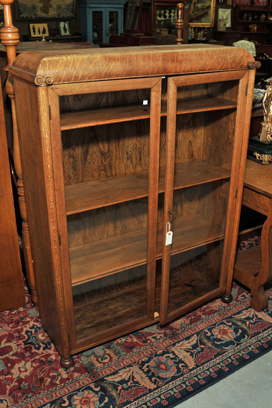 Appraisal: BOOKCASE Oak bookcase with rounded top two large glazed doors