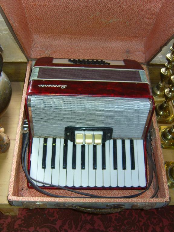 Appraisal: A Sorrento piano accordion and case -