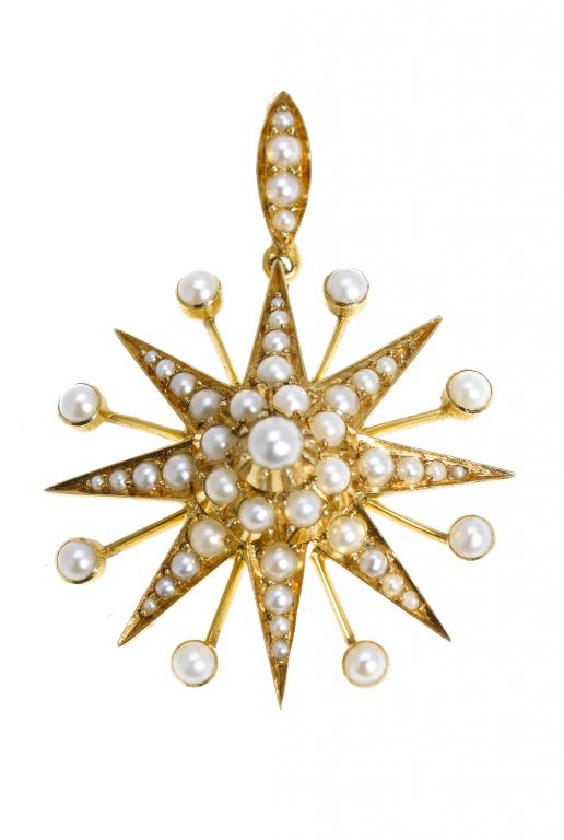 Appraisal: A VICTORIAN SEED PEARL STAR PENDANT suspended from a matching