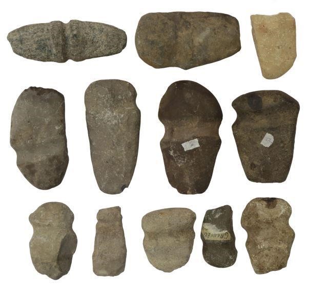 Appraisal: lot of Native American stone axe heads all with evidence