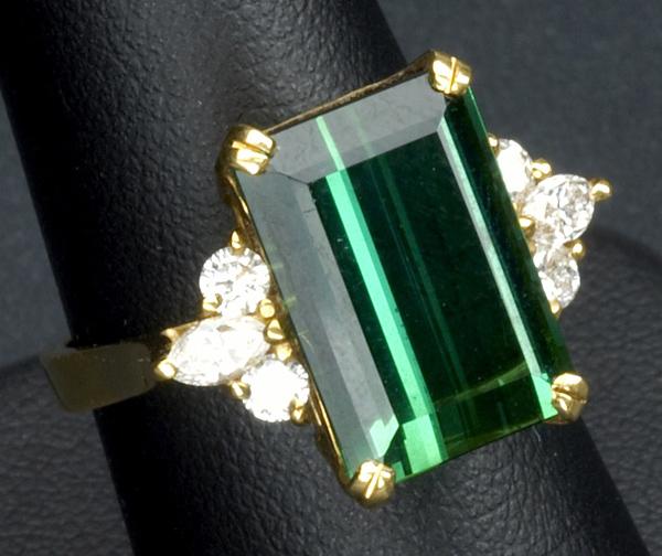 Appraisal: DIAMOND AND TOURMALINE RING k yg emerald-cut tourmaline cts set