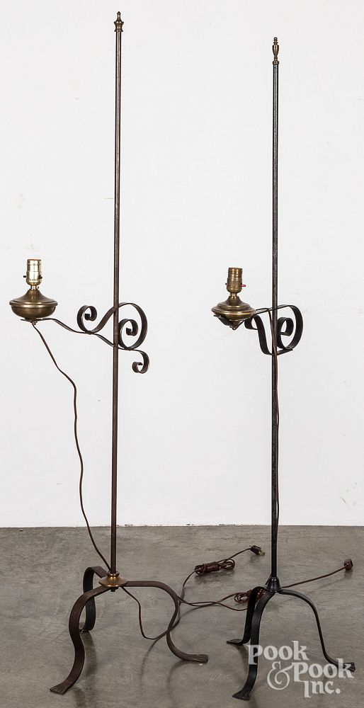 Appraisal: Two iron floor lamps Two iron floor lamps h and