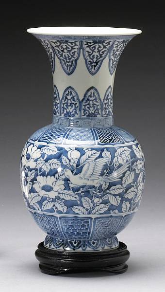 Appraisal: A blue and white porcelain trumpet mouth vase The body