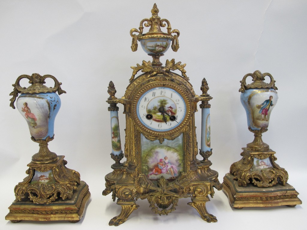 Appraisal: French porcelain and gilt metal clock and garniture