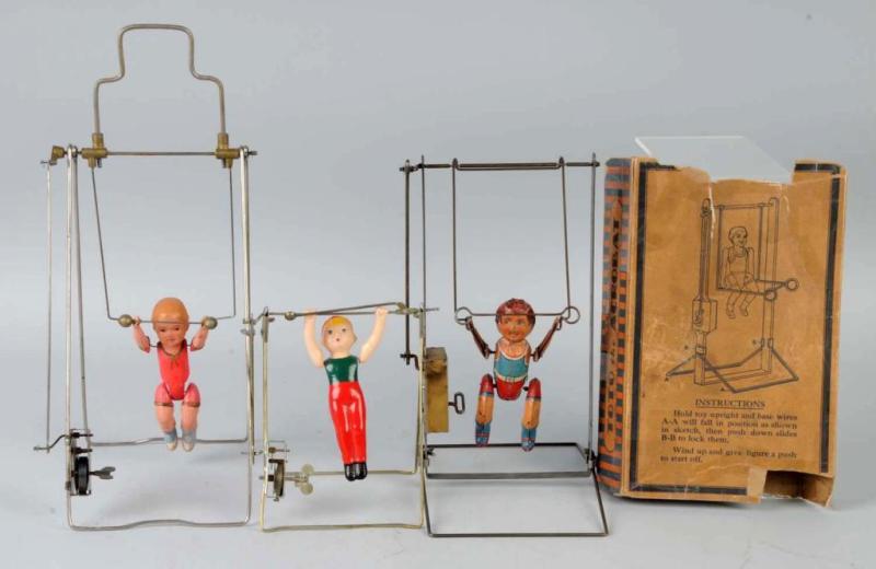 Appraisal: Lot of Acrobat Wind-Up Toys Description Working One is Marx