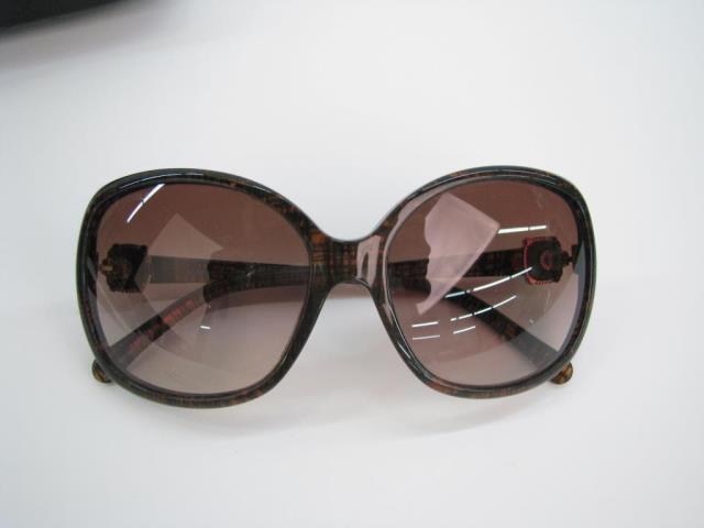 Appraisal: Chanel brown tweed pattern frame oversized sunglasses in original quilted