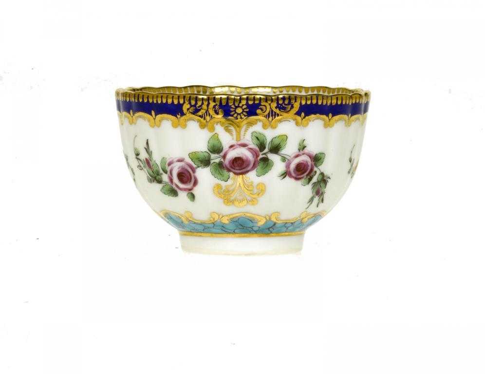 Appraisal: A DERBY REEDED TEA BOWL after a Worcester original enamelled