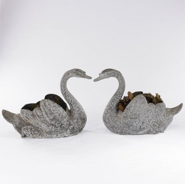 Appraisal: PAIR OF COMPOSITION SWANS Fiberglass th C x