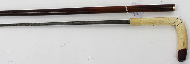 Appraisal: AN ANTIQUE POSSIBLY FRENCH SWORD STICK with horn handle and