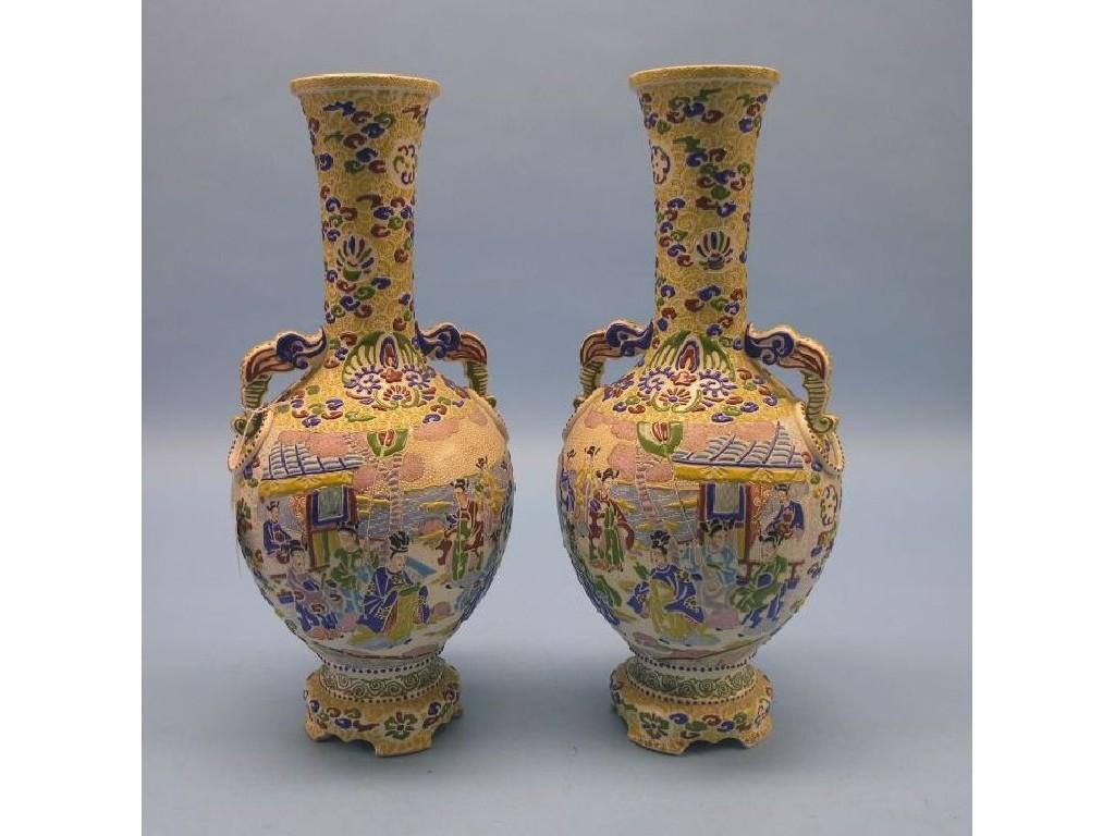 Appraisal: A large pair of Satsuma vases two-handled globe-and-shaft form brightly