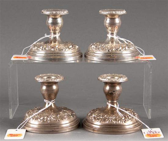 Appraisal: Four American repousse silver candleholders S Kirk Son Baltimore weighted