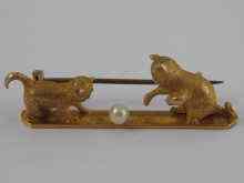 Appraisal: A yellow metal tests carat gold bar brooch designed as