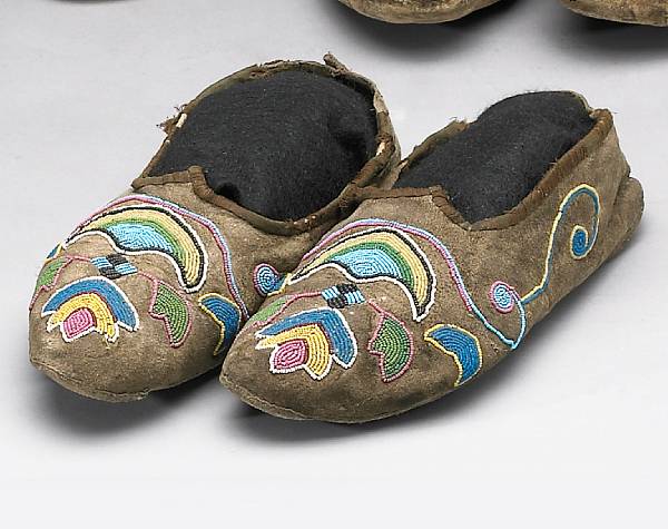 Appraisal: A pair of Plateau beaded moccasins length in