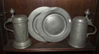 Appraisal: Pewter Steins and Plates Steins H Plates Diameter