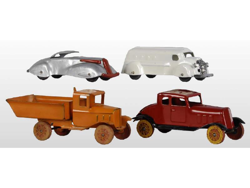 Appraisal: Lot of Pressed Steel Toy Autos Trucks Description Wyandotte coupe