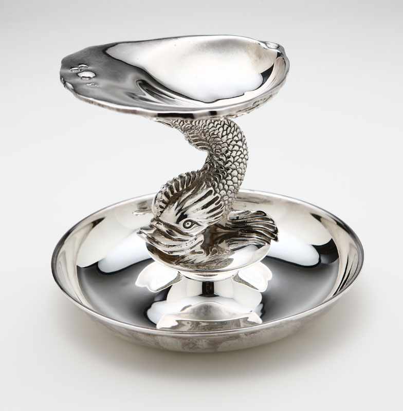 Appraisal: An Irish sterling silver dolphin-form footed tazza Dublin with maker's