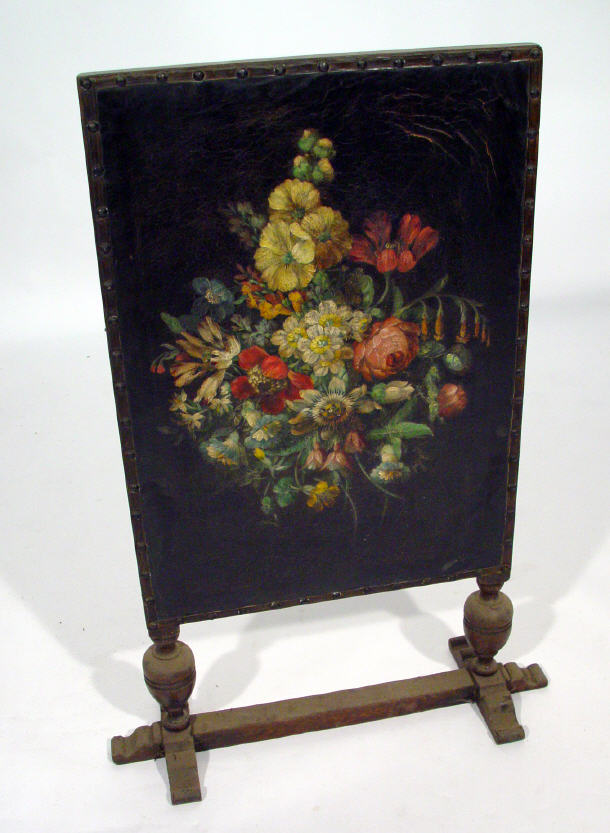 Appraisal: Oak fire screen the leather panel hand painted with flowers