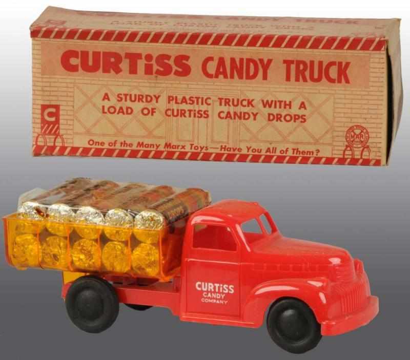 Appraisal: Plastic Marx Curtiss Candy Truck Toy Description American Original ten