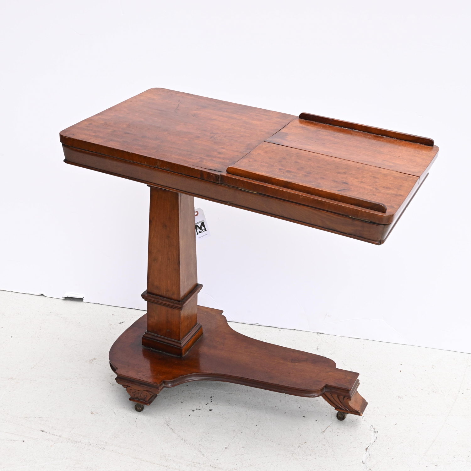 Appraisal: VICTORIAN CARVED MAHOGANY INVALID TABLE th Early th c with