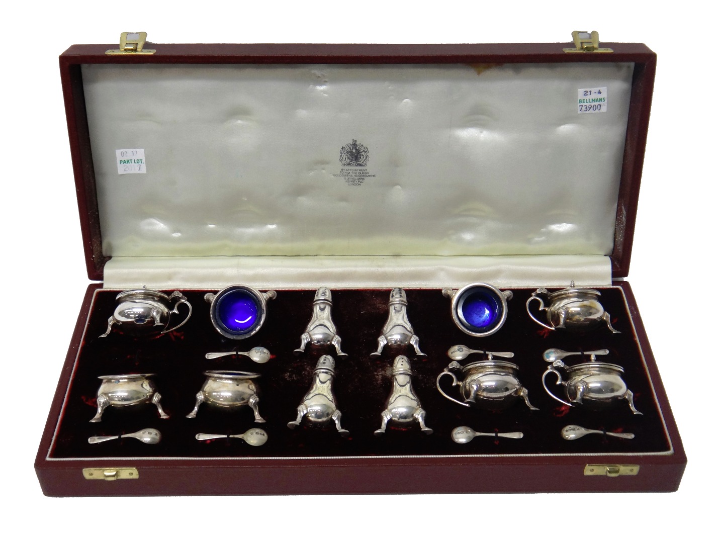 Appraisal: A silver twelve piece condiment set comprising four mustard pots