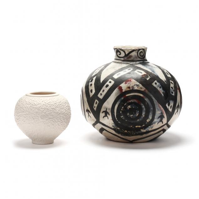 Appraisal: TWO CONTEMPORARY POTTERY VASES The largest a bulbous raku vessel