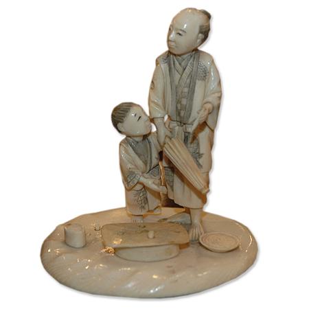 Appraisal: Japanese Ivory Okimono of a Man and Boy Estimate nbsp