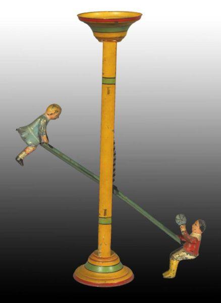 Appraisal: Tin Gibbs Sea-Saw Toy Description Depicts boy and girl going