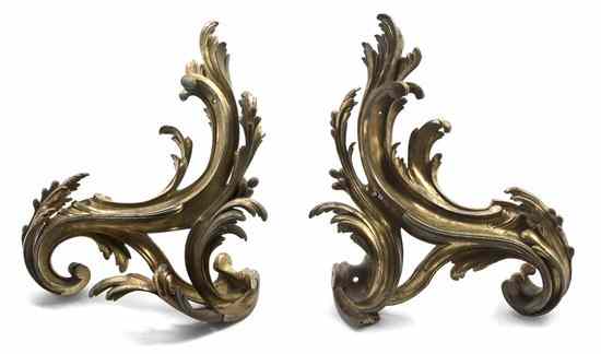 Appraisal: A Pair of Continental Gilt Bronze Chenets each of flowing