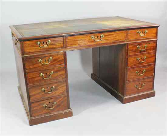 Appraisal: A George III mahogany pedestal desk the leather inset top