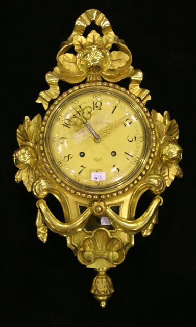 Appraisal: A Swedish gilt wood wall clock with convex dial carved