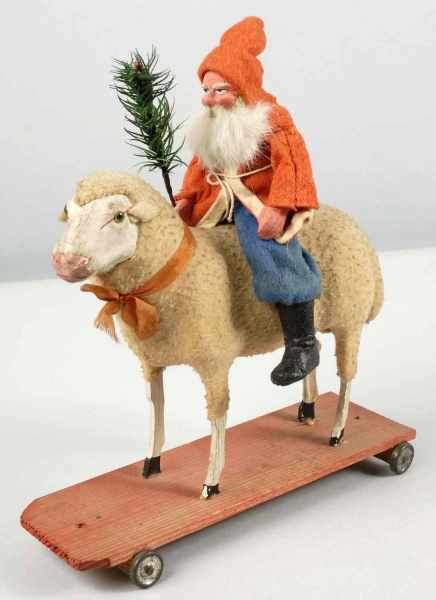 Appraisal: Rare Santa Riding Sheep Pull Toy Description Santa has composition