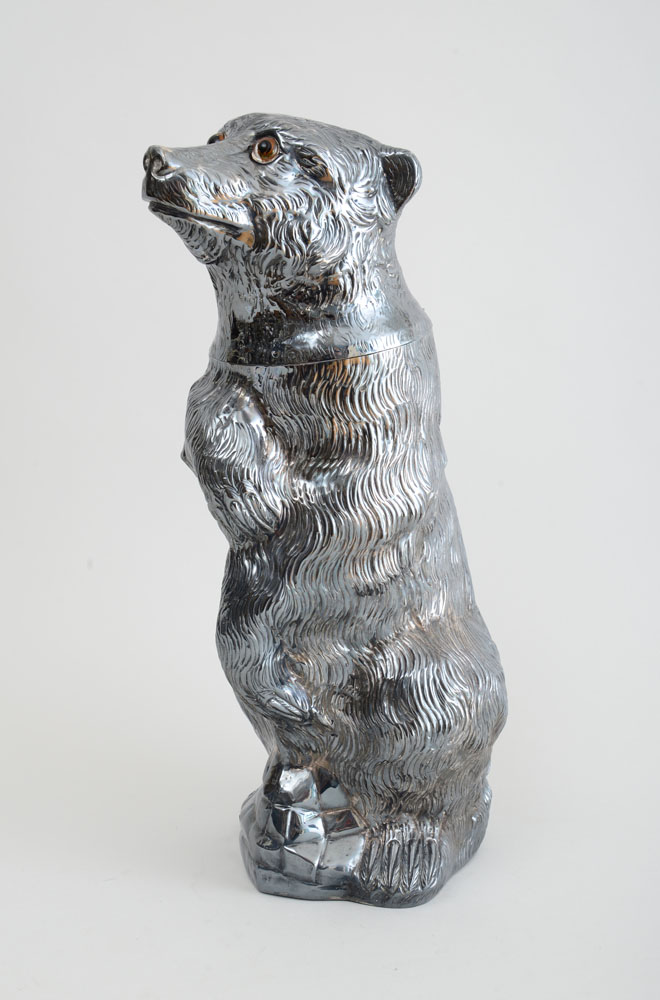 Appraisal: ITALIAN SILVER-PLATED PERFORMING BEAR-FORM LIDDED CONTAINER Modeled standing on rear