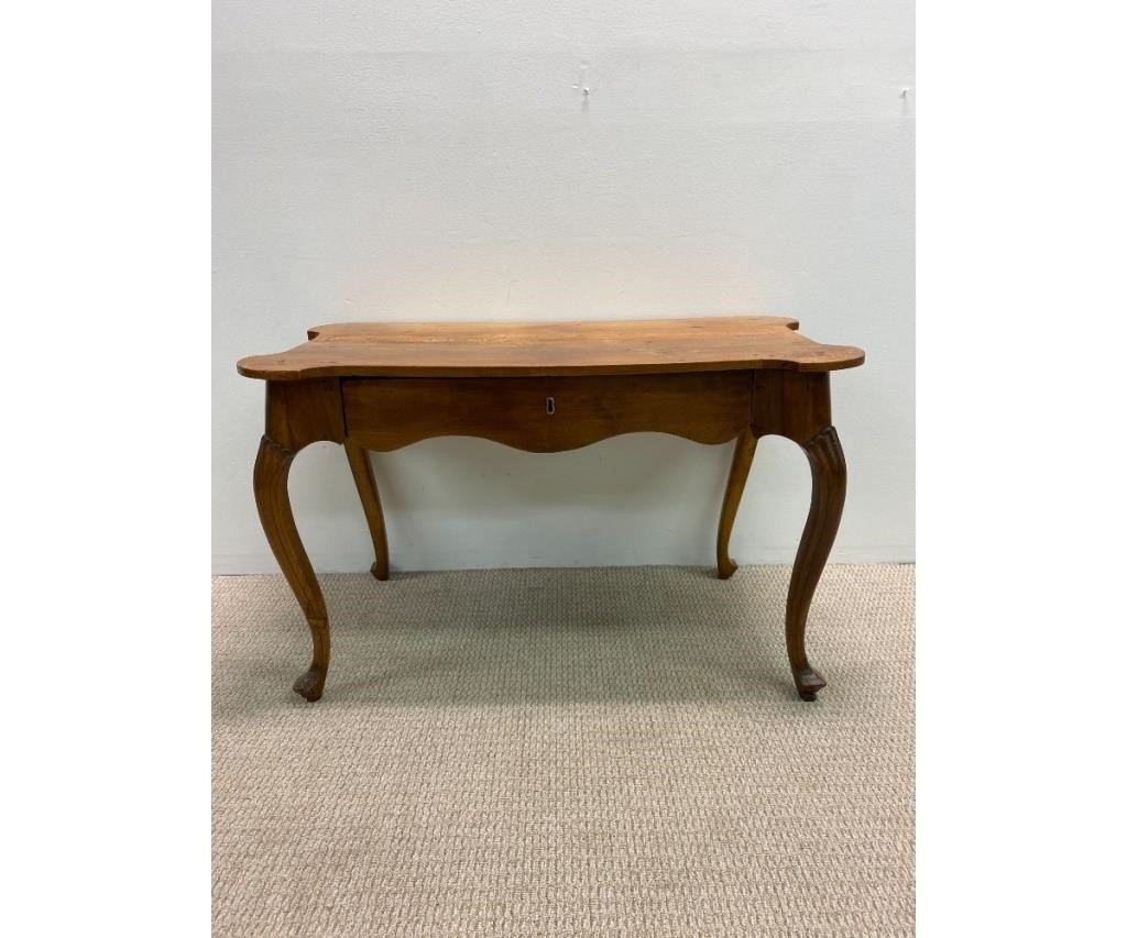 Appraisal: Italian fruitwood writing desk th c with single drawer and