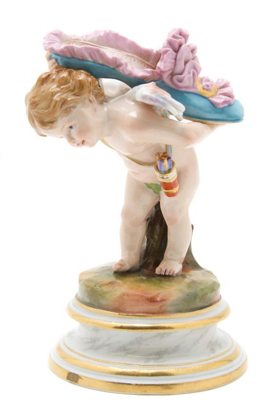 Appraisal: Meissen Porcelain Figure depicting Cupid carrying a shoe impressed incised