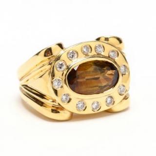 Appraisal: KT Andalusite and Diamond Ring bezel set to the center