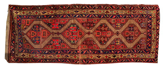 Appraisal: AN ANTIQUE ORIENTAL CAMEL GROUND RUG with four central diamond