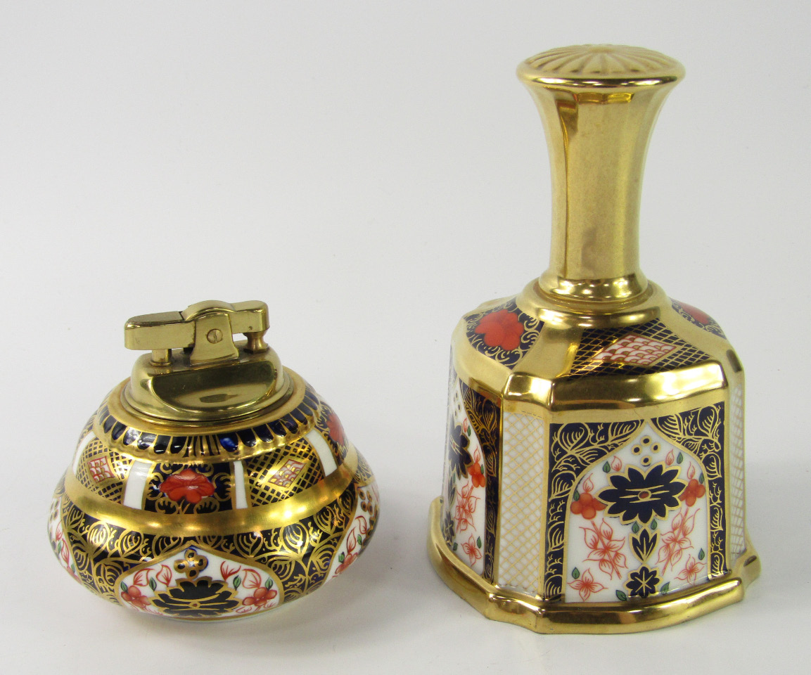 Appraisal: A Royal Crown Derby porcelain bell and a table lighter