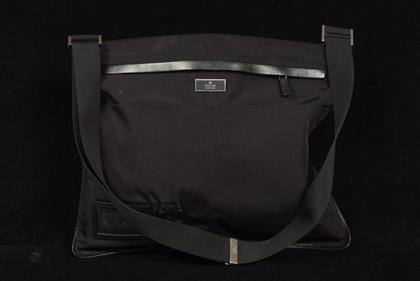 Appraisal: Gucci flat black nylon messenger bag contemporary Flat multi-compartmented messenger