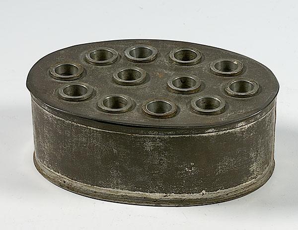 Appraisal: PEWTER TIN SUPPOSITORY MOLD ca pewter and tin box-style suppository