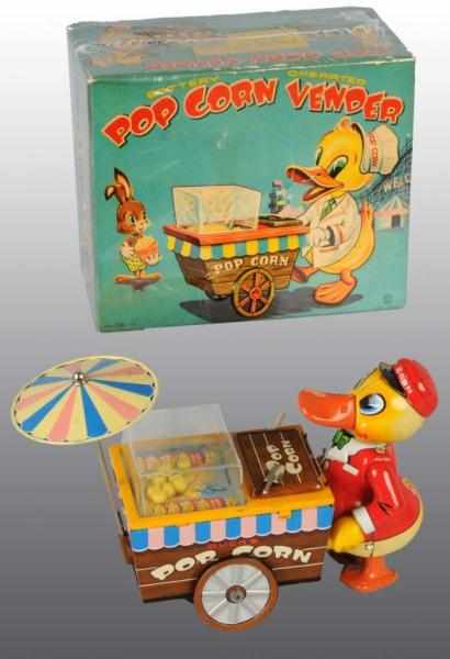 Appraisal: Tin Duck Popcorn Vendor Battery-Operated Toy Description Japanese Working Made