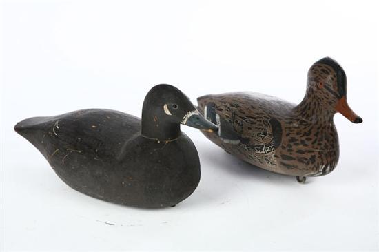 Appraisal: TWO DECOYS American th century wood Mallard hen l and