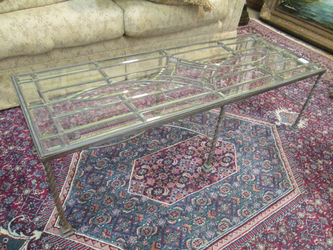 Appraisal: LEADED BEVELED GLASS AND WROUGHT IRON COFFEE TABLE having a