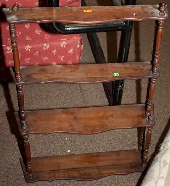 Appraisal: Stained wood four-tier knickknack shelf Estimate - All property is