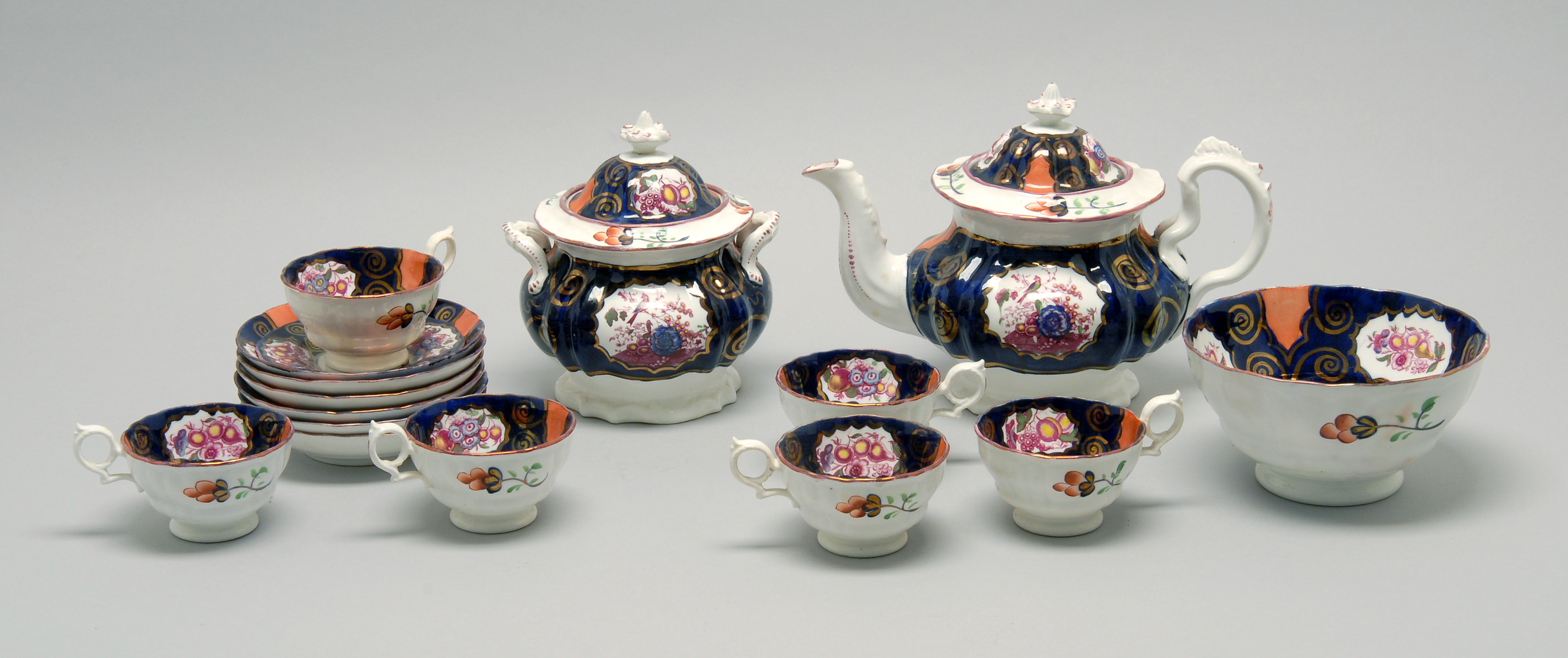 Appraisal: ENGLISH LUSTRE ENAMEL AND TRANSFER-DECORATED POTTERY TEA SERVICE th CenturyTeapot