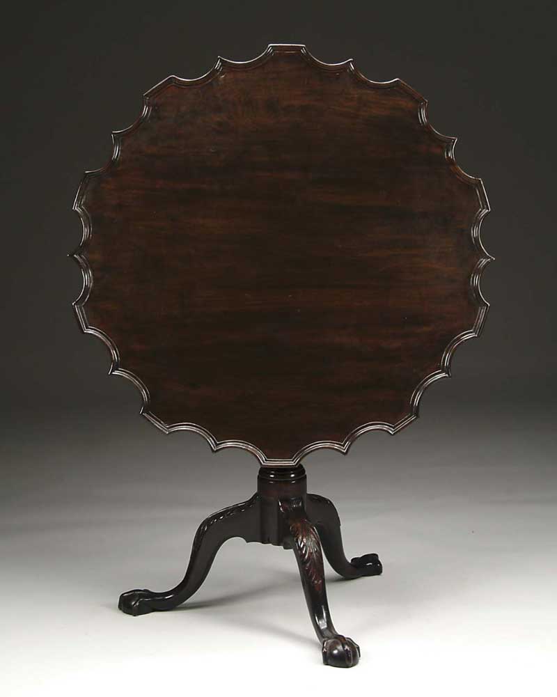 Appraisal: GEORGIAN PIE CRUST TILT TOP TEA TABLE Nicely carved pie